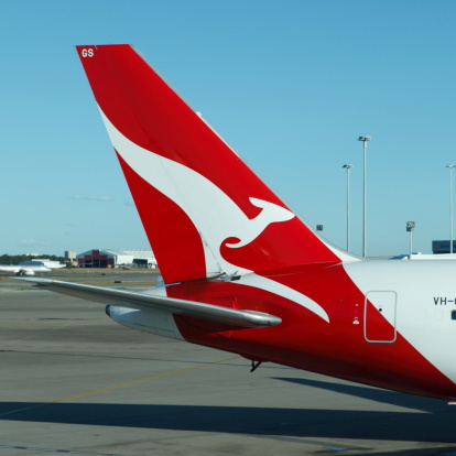 Brisbane, Australia - August 18, 2011: Qantas is an Australian airline with an international reputation for safety and quality. It is known for its distinctive kangaroo design on the aircraft tail. Here is a Qantas 767 tail at Brisbane airport.