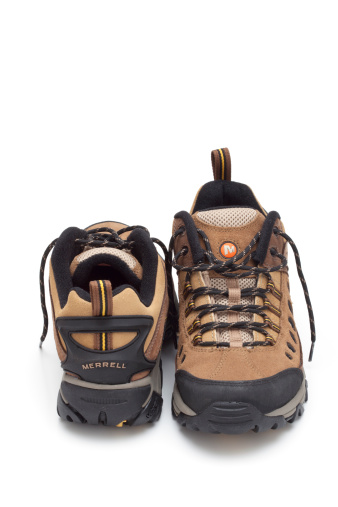 Trebnje, Slovenia, - November 01, 2011: Merrell brand hiking shoes, photographed in the studio on a white background.