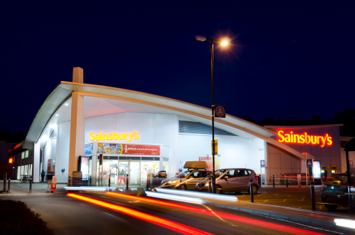 Cheltenham, United Kingdom - March 4, 2011: Sainsbury's supermarket at dusk, Priors road, Cheltenham. This particular supermarket is a medium sized store build on land previously owned by GCHQ.