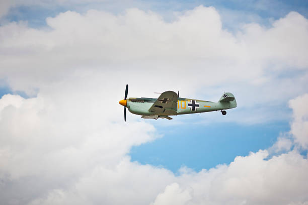 Fairford, UK - July, 17, 2010: A Messerschmitt BF109 flies past at low level during an air show. The display is RIAT (Royal International Air Tattoo) 2010 in Fairford, England, the largest military airshow in the world. Messerschmitt BF109s are unusual visitors at air shows in the UK.