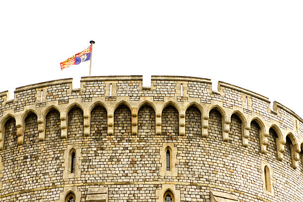 part of the citywall in Nuremberg, Germany with typical round fortified watchtower in background and red-white franconian flag