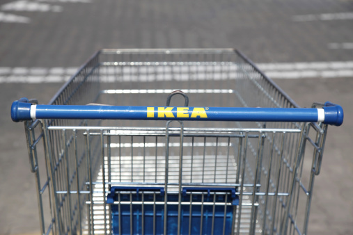 Warsaw, Poland - June 11, 2011: IKEA sign on the shopping cart. IKEA is a Swedish company and the largest furniture retailer in the world.