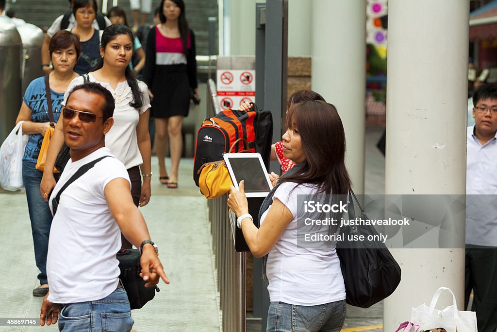 Touristen mit iPad - Lizenzfrei Asiatischer und Indischer Abstammung Stock-Foto