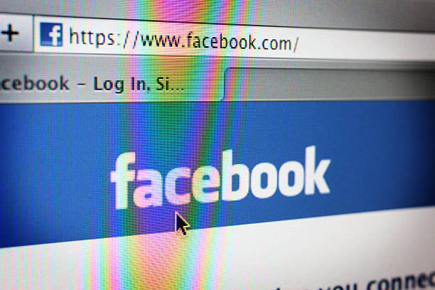 Facebook Website Hong Kong, China - March 10th, 2011: The facebook homepage, focusing on the logo, displaying on a Mac Safari browser. Facebook is the largest social media network on the web. cursor photos stock pictures, royalty-free photos & images