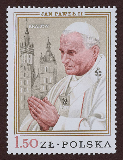 Postage Stamp, Pope John Paul II, portrait Ogrodzieniec, Poland - February 22, 2012: Photo Study of a postage stamp commemorating the visit of Pope John Paul II in Poland. The stamp shows the painted portrait of the Pope against the St. Mary's Church in Krakow pope john paul ii stock pictures, royalty-free photos & images