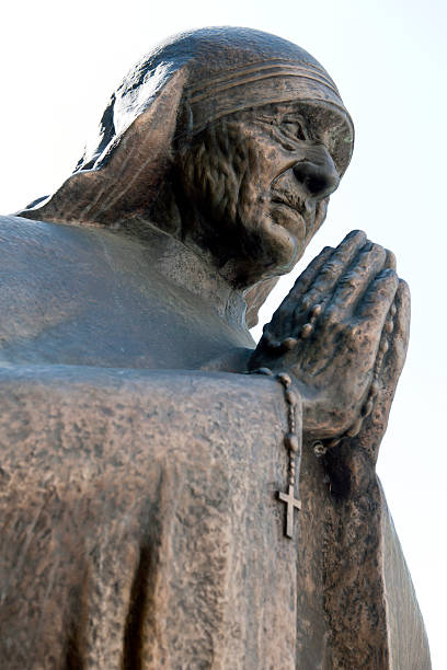 Skopje, Macedonia - May 12th, 2011: The statue of The Blessed Teresa of Calcuta in front of The Mother Teresa Memorial House; her home town Skopje, the Republic of Macedonia. The memorial house was built on the Macedonia street, on the very location of the once Sacred Heart of Jesus Roman Catholic Church, where Mother Teresa was baptized.