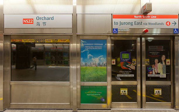 Orchard MRT Station Singapore City, Singapore - May 15, 2010 : Orchard MRT Station is located in Orchard Road, Singapore. Orchard MRT Station providing the services for North South Line. singapore mrt stock pictures, royalty-free photos & images