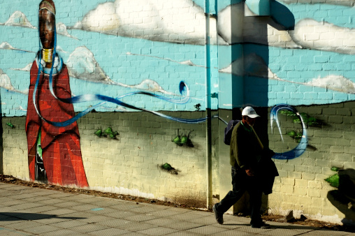 Cape Town, South Africa - February 21, 2006: Graffiti against old building wall, near the Cape Technicon