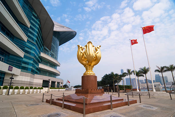 Hong Kong, Hong Kong - Apr 14, 2009: Golden Bauhinia Square of the Hong Kong Convention and Exhibition Centre, where a tourist attraction of a flag-raising ceremony is held everyday.