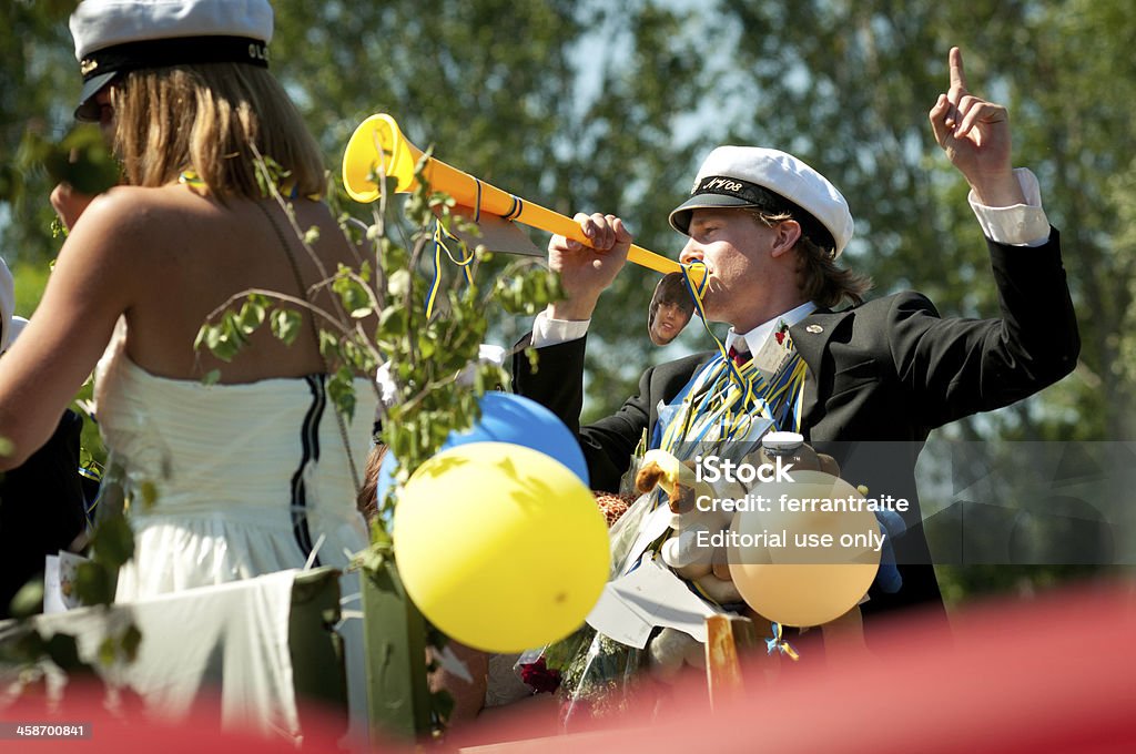 Swedish high school graduation Sandviken, Sweden - June 10, 2011: Swedish high school students with traditional graduation hats celebrating their graduation day Graduation Stock Photo