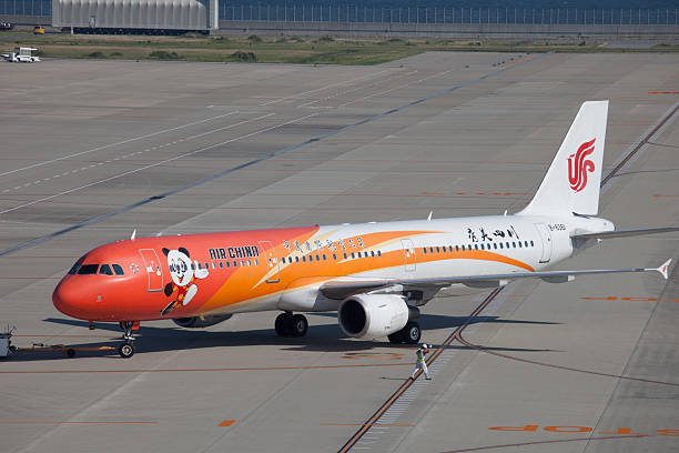 a air china airbus a321 no japão - chubu centrair international airport - fotografias e filmes do acervo