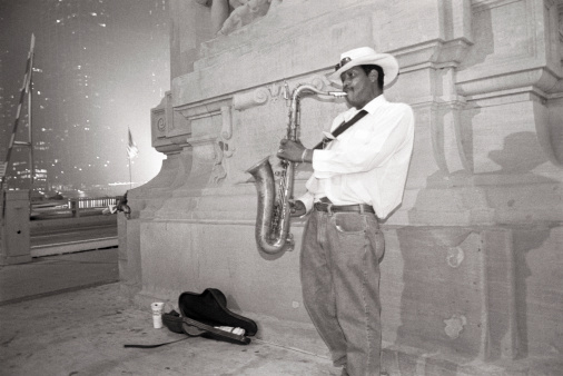 Chicago, USA, June 21 1996a saxophone player in the city of Chicago nocturnal city life reflecting the cultural identity of chigaco as blues town