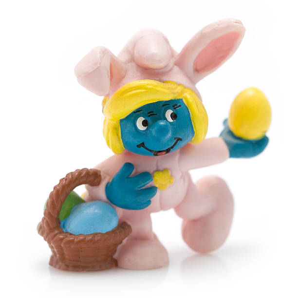 Easter Smurfette with basket stock photo