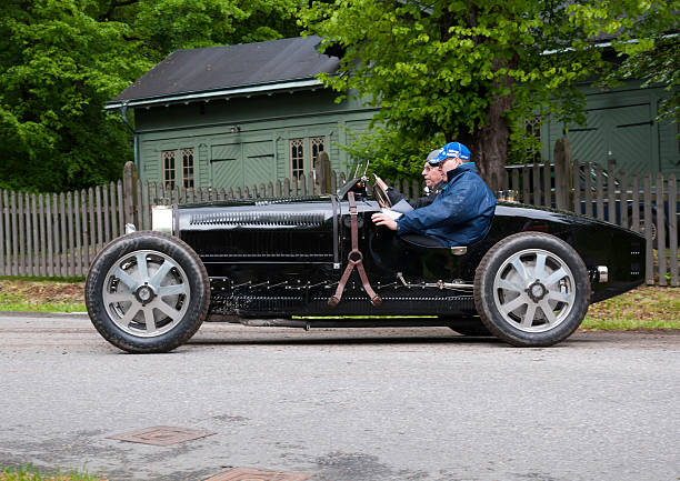 Bugatti T51 from 1931 "Stockholm, Sweden - June 03, 2012: A fully restored Bugatti T51 from 1931, in a classic car cavalcade around the small island DjurgAYrden on public road in Stockholm Sweden" 1950s racing car stock pictures, royalty-free photos & images