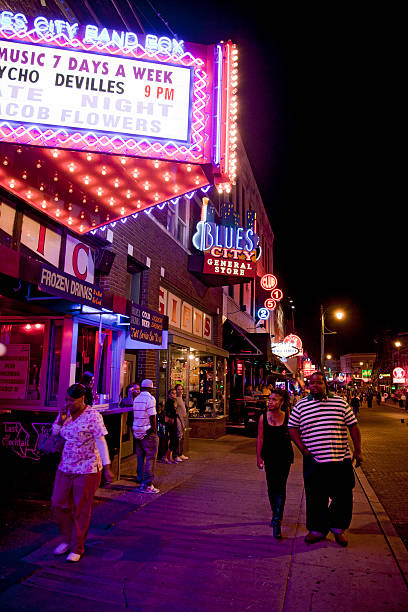 Memphis, Tennessee, USA - 16th October 2010:People walking along historic Beale Street - the Home of the Blues - which is pedestrianised at night.Downtown Memphis.