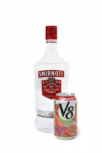 West Palm Beach, USA - January 23, 2011: Studio shot of Smirnoff Vodka and V8 Vegetable Juice. Smirnoff manufactured by Smirnoff Co, Norwalk CT. V8 manufactured by Campbells Soup Co, Camden NJ.