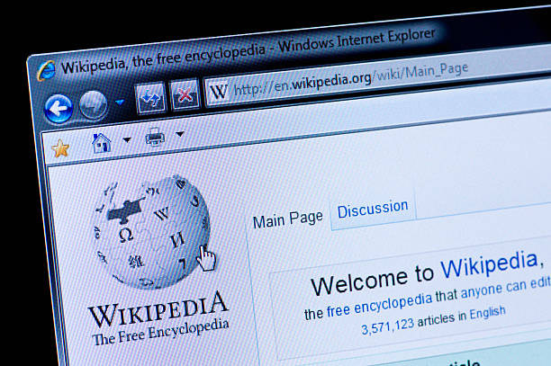 Wikipedia - Macro shot of real monitor screen Essen, Germany - February 28, 2011: Part of Wikipedia site in Internet Explorer browser on LCD screen. Wikipedia is a 15 Founded in January 2001 free online encyclopedia in several languages. The German Wikipedia has over a million and the English-language Wikipedia well over three million items. wikipedia stock pictures, royalty-free photos & images