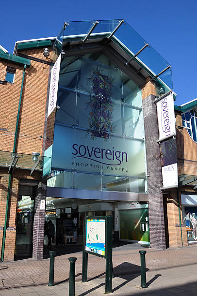 Sovereign Shopping Centre Bournemouth, UK - March 6, 2011: The front of the Sovereign Shopping Centre in Boscombe in Bournemouth. Various signs and logos. boscombe photos stock pictures, royalty-free photos & images