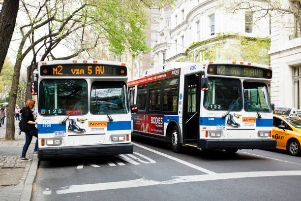 Buses on Fifth Avenue Manhattan stock photo