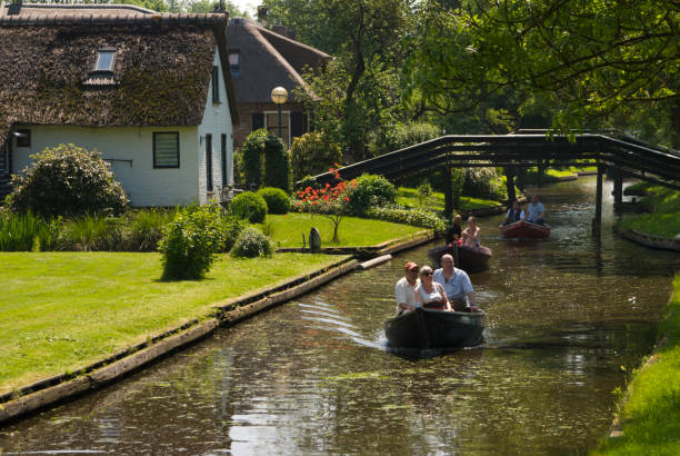 Canal tour in Giethoorn stock photo