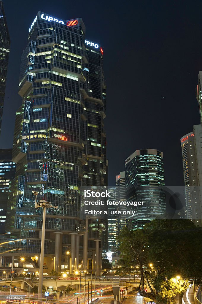 Quartier Admiralty de Hong Kong Lippo Centre gratte-ciel illuminé la nuit en Chine - Photo de Acier libre de droits