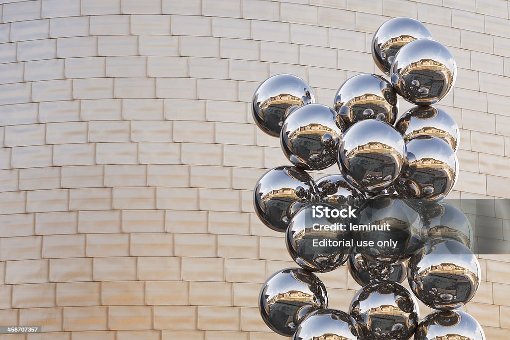 Tall Tree and the Eye by Anish Kapoor Bilbao, Spain - February 24, 2011: The sculpture "Tall Tree and the Eye" by Anish Kapoor located in front of the Guggenheim Museum in Bilbao. The sculpture is a tall vertical structure made by stainless steel spheres. Guggenheim Museum Bilbao Stock Photo