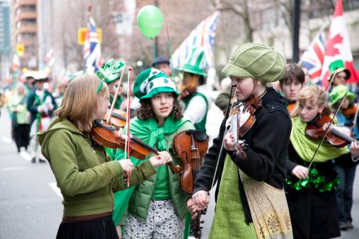 Vancouver, BC, Canada-March 16, 2008:This is a celebration for Saint Patrick\\'s Day in Vancouver downtown. The parade was consisted of musicians, bands, and other instrumental players. The colour green and the four leaf clover is a symbol for this day.