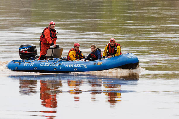 River Rescue, Kayaker Rescued and Brought Back To Shore stock photo