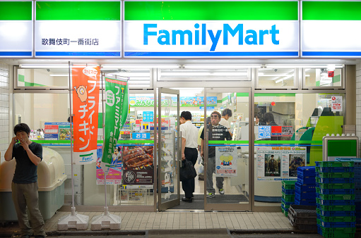 Tokyo, Japan - July 5, 2011: Exterior of a Shinjuku FamilyMart convenience store. FamilyMart is the 3rd largest convenience store chain in Japan and 1st largest in South Korea.