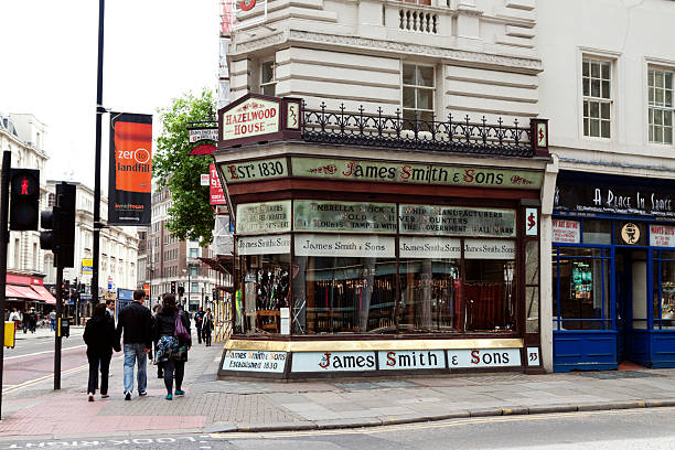 London, England - May 27, 2011: James Smith and Sons, a traditional umbrella shop in London. The family-owned business was founded in 1830 and has a wonderful old-fashioned and historic Victorian shop in New Oxford Street, Central London. They specialise in umbrellas, walking sticks and canes.