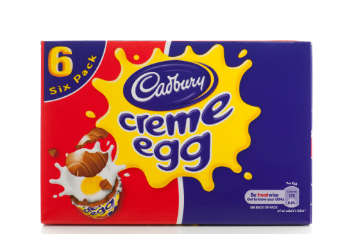 London, England-March 8, 2011.  Box of six individually wrapped Cadbury creme eggs on a white background.
