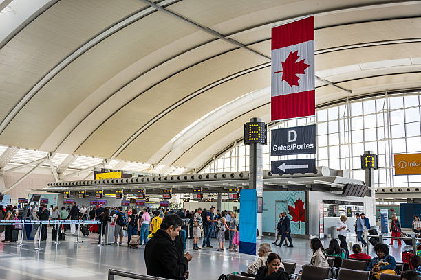 Toronto Pearson International Airport "Toronto,Canada-August 15, 2013: Pearson International Airport. One of largest and busiest airport in the world. About 1100 planes take off or land in a day." canadian culture stock pictures, royalty-free photos & images