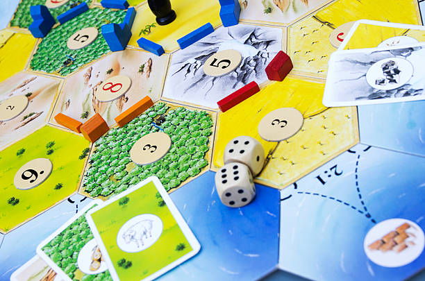 Utrecht, The Netherlands - July 4, 2011: Close-up Image of the famous board game The Settlers of Catan created by the German Klaus Teuber in 1995. In the game, players take the role of settlers and try to build and develop a settlement by trading resources with the other players.