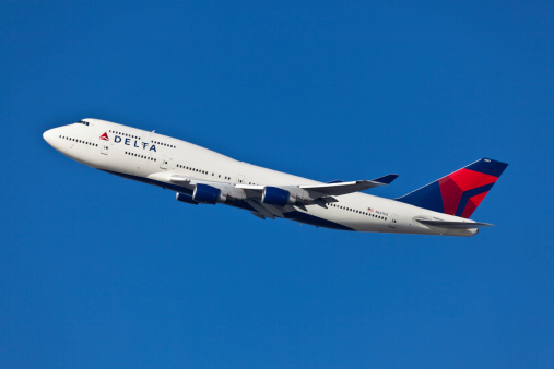 New York, USA - December 26, 2011: Boeing 747 Delta Air Lines taking off from John F Kennedy International Airport located in New York