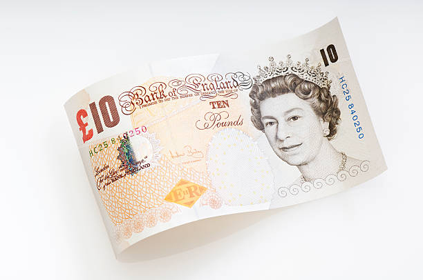 ter desfraldado nota de dez pounds/moeda britânica - pound symbol ten pound note british currency paper currency - fotografias e filmes do acervo