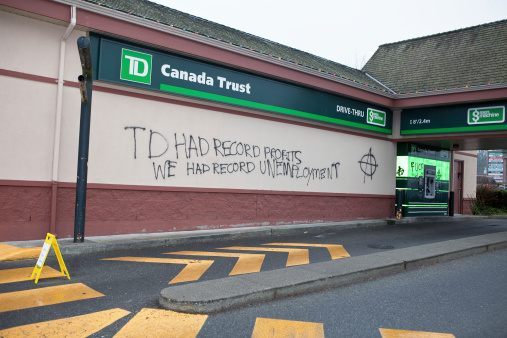 Langley, Canada on December 6,2011. Graffiti on an outside wall of the TD Bank.