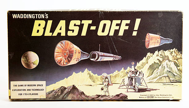 Waddington's "Blast-Off" Board Game "Welling, UK - 6th May 2012. BLAST-OFF! The 1960's board game made by UK company Waddington. Studio shot with plain background." buzz aldrin stock pictures, royalty-free photos & images