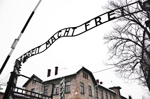 Auschwitz, Poland - January 1, 2011: The Auschwitz concentration camp is located about 50 km from Krakow. The picture shows entrance to the concentration camp with sign \\\
