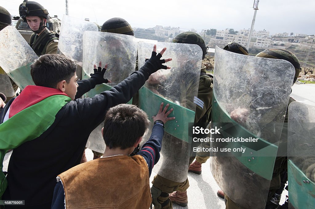 Soldats israéliens et palestiniens Manifestation - Photo de Culture palestinienne libre de droits