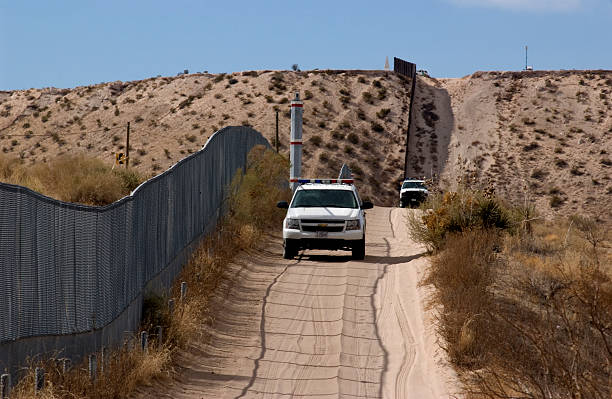 Border Fence and US Patrol stock photo