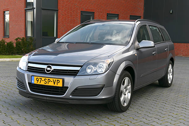 Wierden, the Netherlands - March 18, 2007 : close-up of a Dutch station wagon, brand Opel Astra, on a parking lot