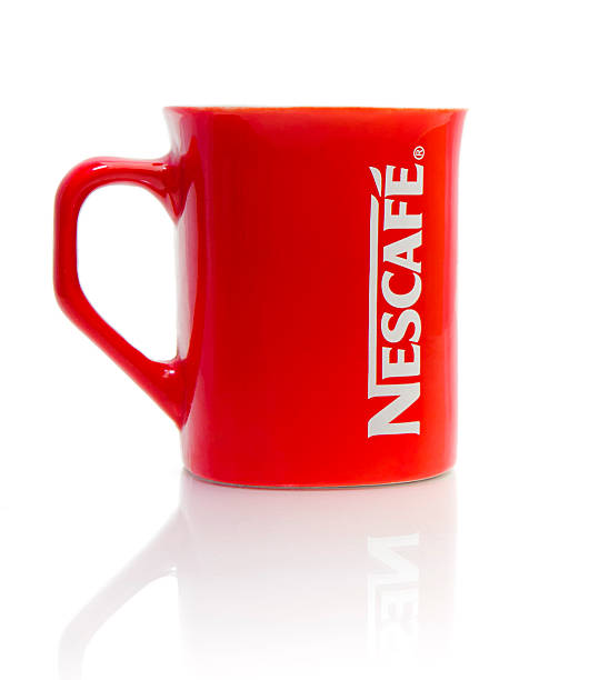 nescafe red cup - nestle stock-fotos und bilder