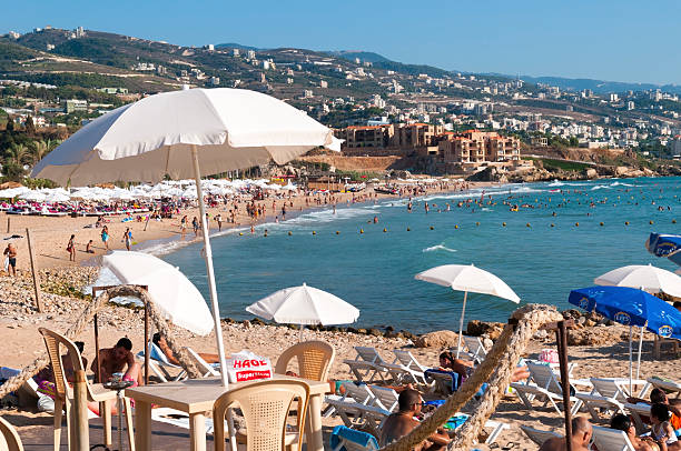 White beach umbrella on the beach