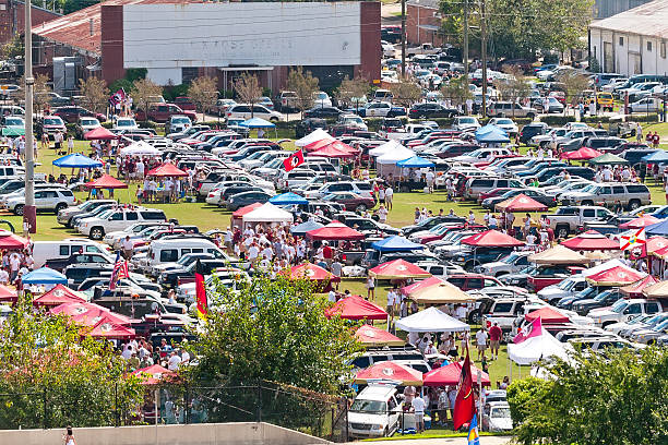 Tailgating Before Start of College Football Game "Tallahassee, Florida, USA - September 26, 2009:  Seminole fans tailgate before the start of a home football game at Florida State University." tailgate party photos stock pictures, royalty-free photos & images