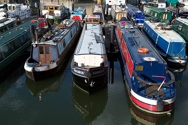 Narrow boats moored in Limehouse Basin, London, UK stock photo