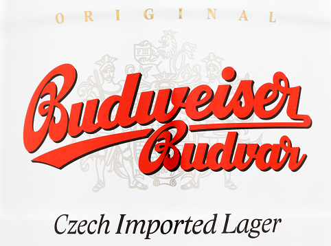 Kyiv, Ukraine - June 13, 2011: Budweiser logo on front  5 liter small barrel. Budweiser Budvar Brewery is a brewery in the city of Ceske Budejovice (Budweis), Czech Republic, that is best known for brewing a beer known as Budweiser Budvar in the European Union, Czechvar in the United States and Canada, and either Budweiser Budvar or Budejovicky Budvar in the rest of the world.
