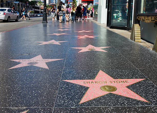 Hollywood Walk of Fame "Hollywood, USA - September 4, 2011: Sharon Stone\'s star on the Hollywood Walk of Fame. Located on Hollywood Boulevard and is one of 2400 celebrity stars made from marble and brass." boulevard photos stock pictures, royalty-free photos & images