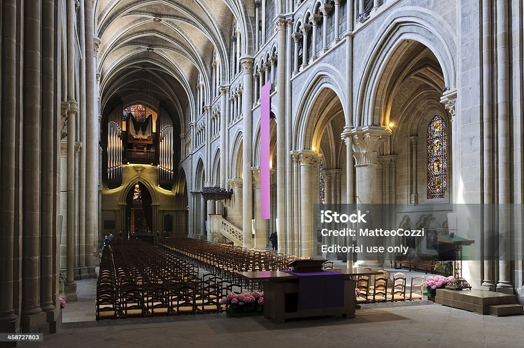 Lausanne cathedral nave from the back. "Lausanne, Switzerland - April 22, 2011: Lausanne cathedral nave from the back." Architecture Stock Photo