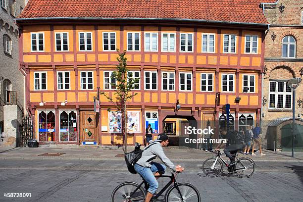 Bicyclists In Front Of The Jørgen Olufsens House Stock Photo