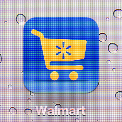 Donets'k, Ukraine - June 22, 2012: Close-up of the Walmart application icon on the screen of the \
